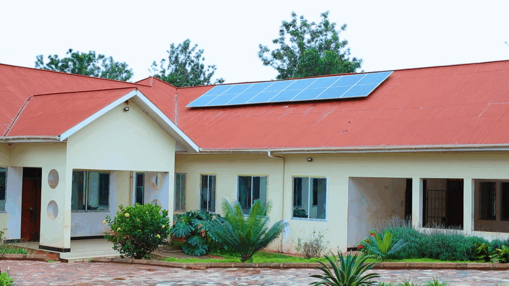 a building with solar panels on the roof