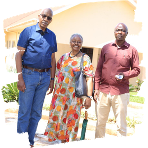 three people stand together smiling